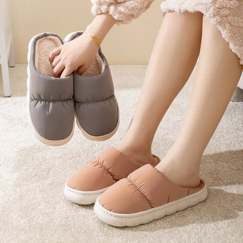 Down cotton couple slippers with artificial leather upper and non-slip rubber soles in multiple colour options