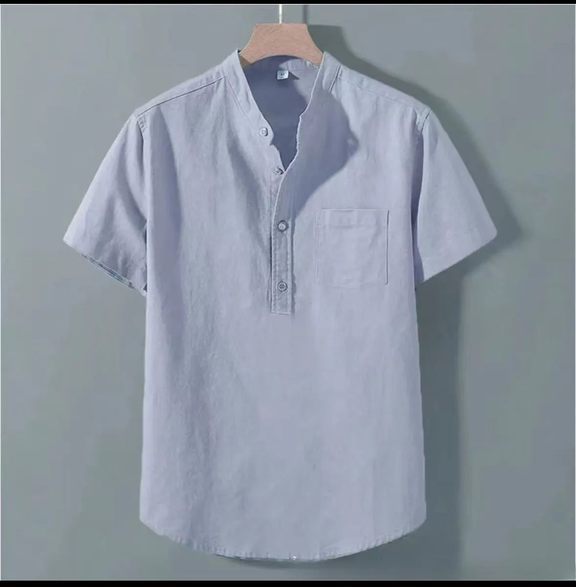 Men's beige casual stand collar short sleeve shirt made from slub linen blend fabric.