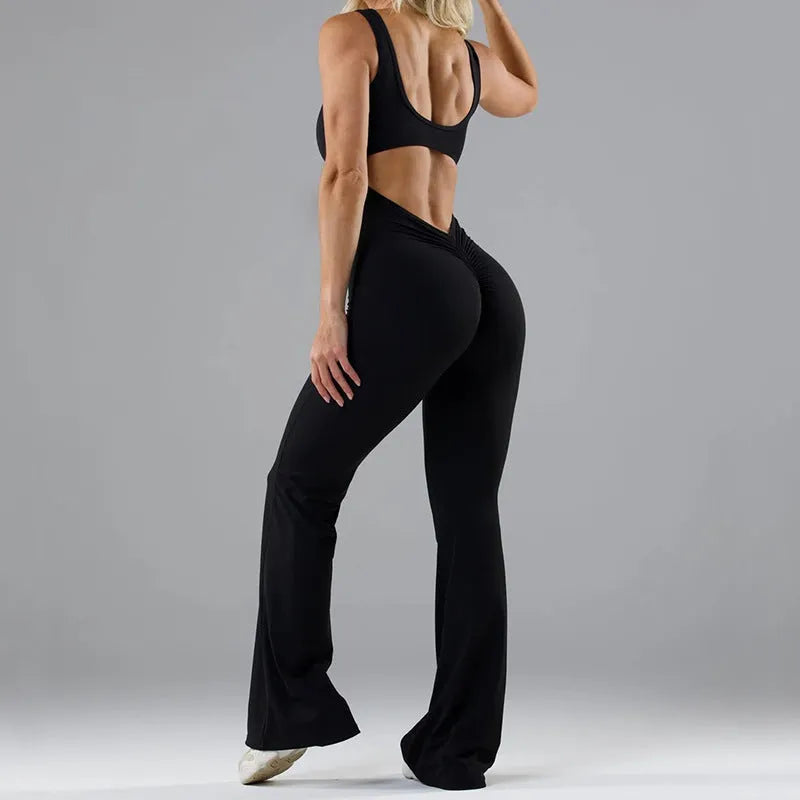 Women's black milk silk yoga bodysuit with hollow back and seamless construction on a mannequin.
