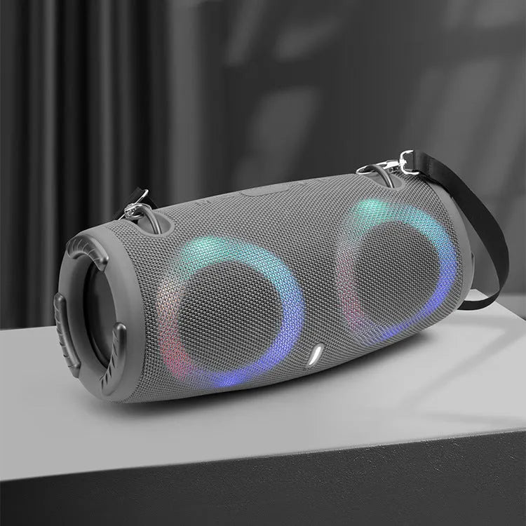 War Drum portable Bluetooth speaker with RGB coloured lights in outdoor setting