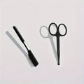 Black pet grooming brush with soft bristles and comb for dogs and cats tear stain removal