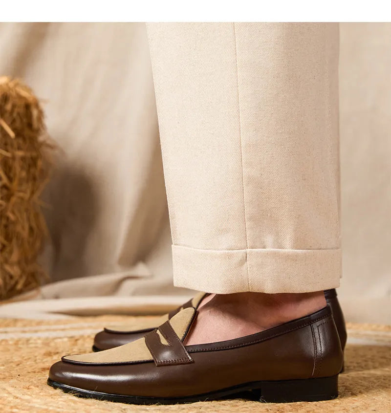 Brown suede leather loafers with high-gloss finish and stitched construction