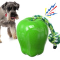 Green apple-shaped plastic dog chew toy with food slot and stem details