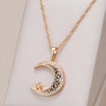 Rose gold star and moon necklace with zircon pendant on a water wave chain.