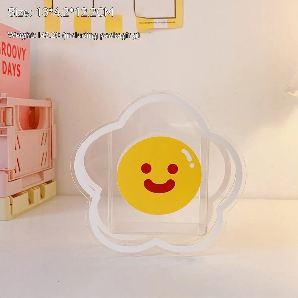 Clear square acrylic storage box with colourful graphic design for desk organisation