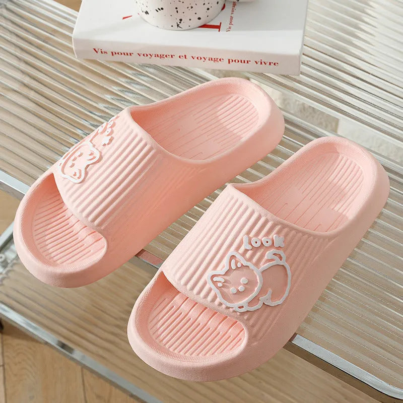 Women's green cat slippers with thick EVA platform sole, shown from above.