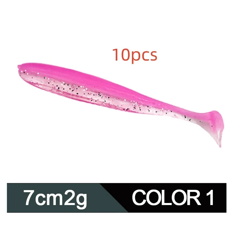 Soft plastic T-tail fishing lure in two-tone mandarin fish pattern, 7cm long.