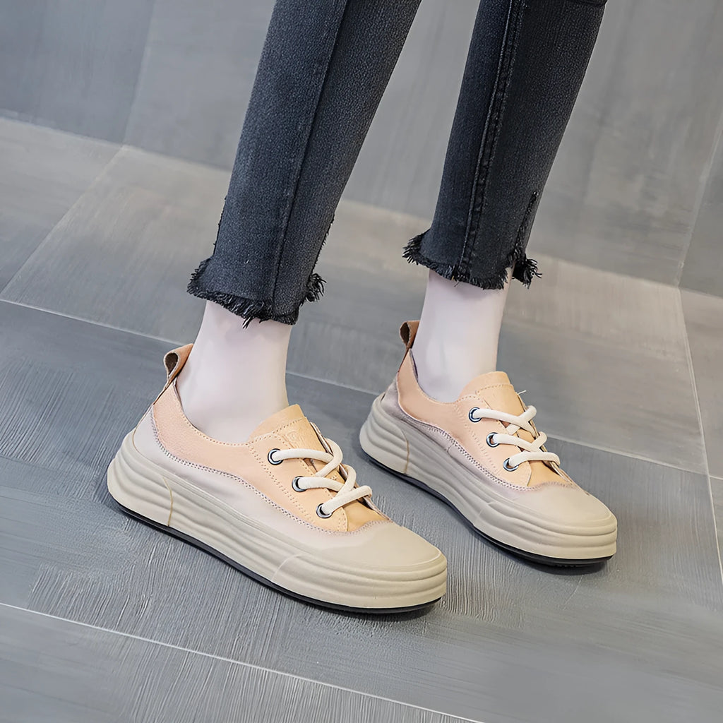 Women's leather platform sneakers in matcha green, showing lace-up front and round toe design.