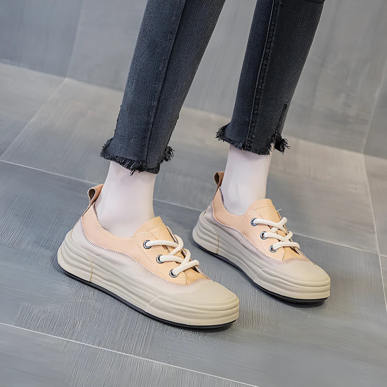 Women's leather platform sneakers in matcha green, showing lace-up front and round toe design.