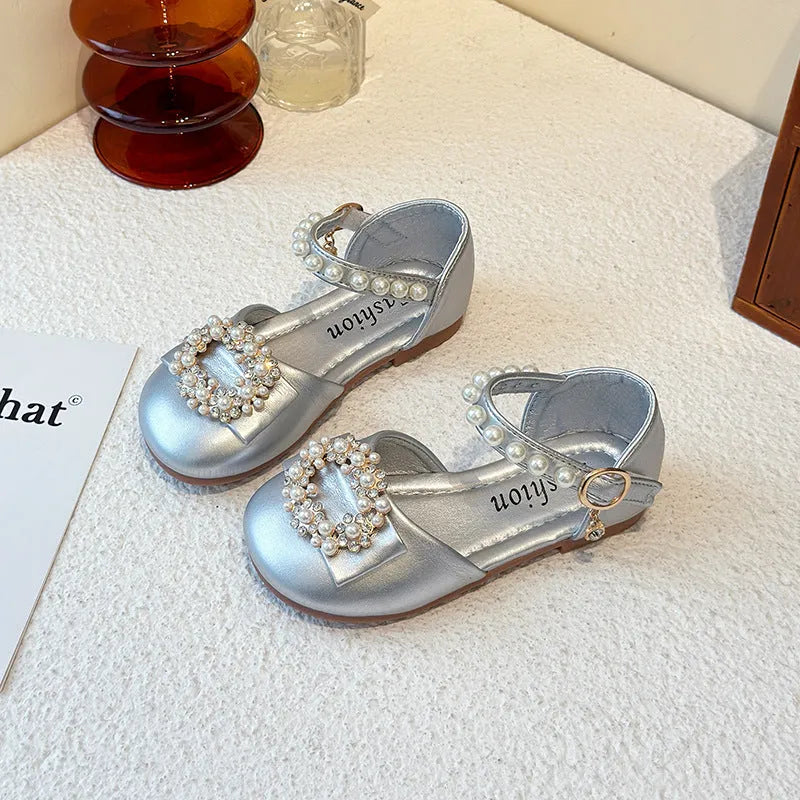 Milky white handmade soft sole cloth princess shoes with pearl detailing and lace-up closure for babies