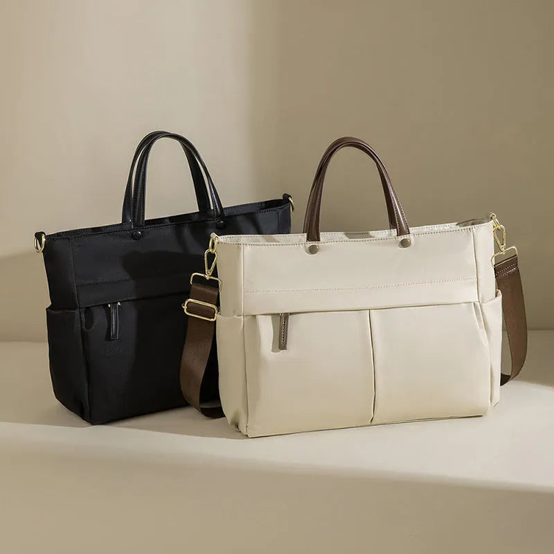 Women's Oxford cloth laptop bag with open pockets showing elegant black and nuts apricots colour options