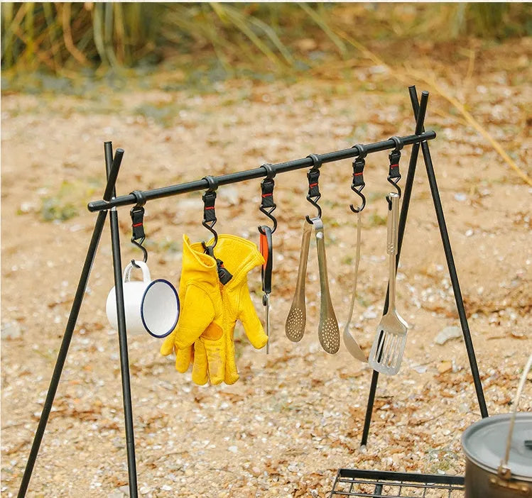 Large silver aluminium foldable triangle camping clothes drying rack with side hanger.