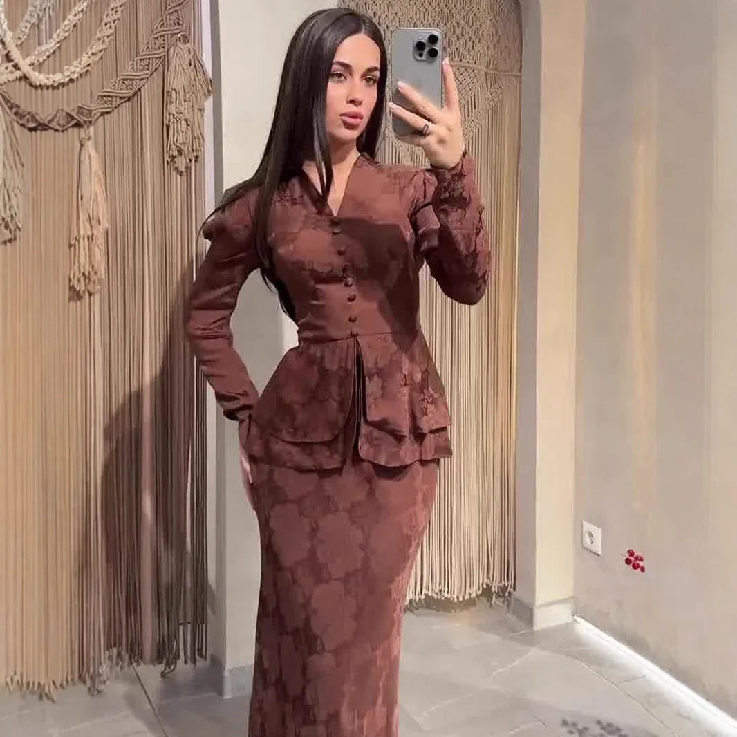 Dark brown retro dress with plants and flowers pattern, long sleeves, and fake two pieces styling