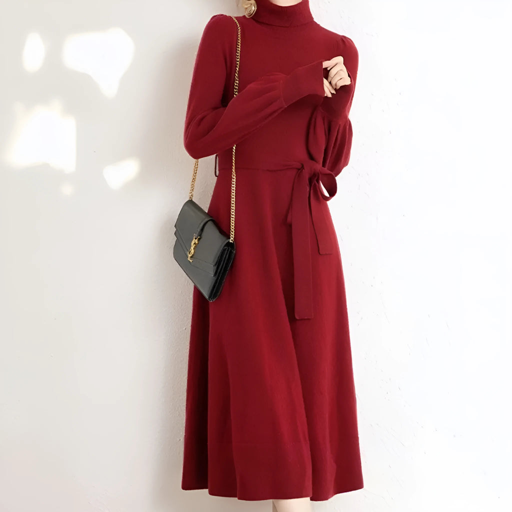 Turtleneck knitwear dress in polyester fabric with elastic waist and loose hem in solid colour