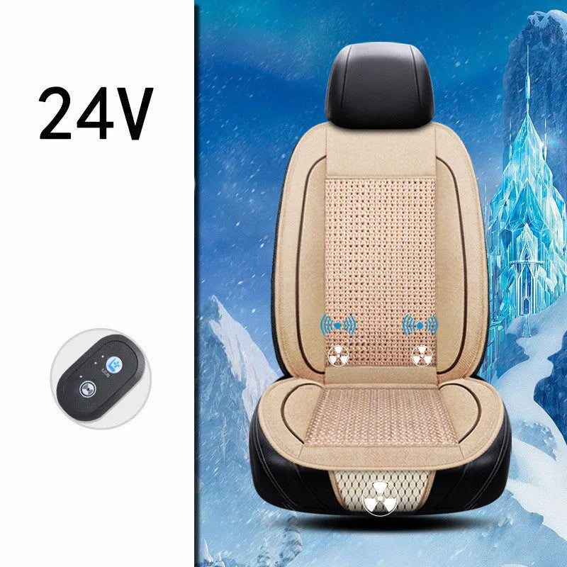 Square black car seat ventilation cushion with power cord, shown on a car seat.