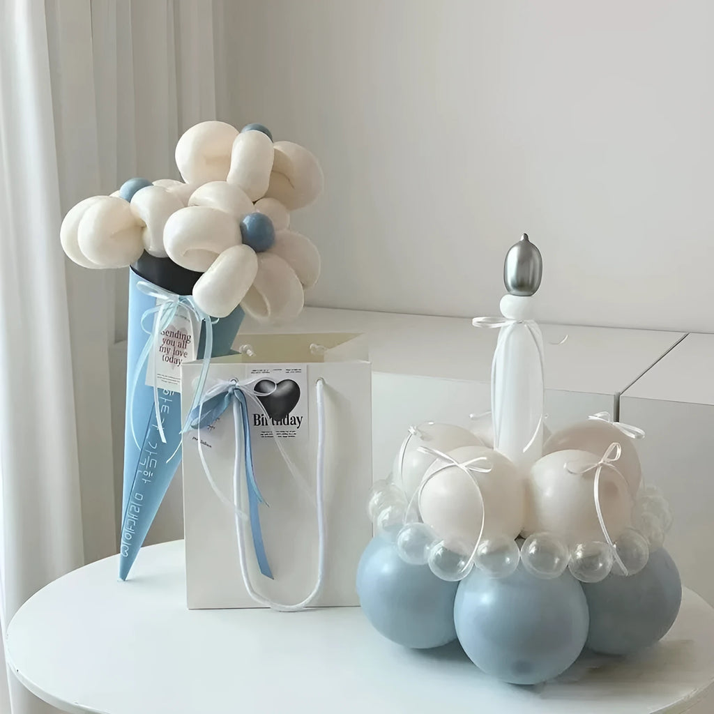 DIY balloon bouquet decoration kit with round balloons for cake toppers, showing one complete set.