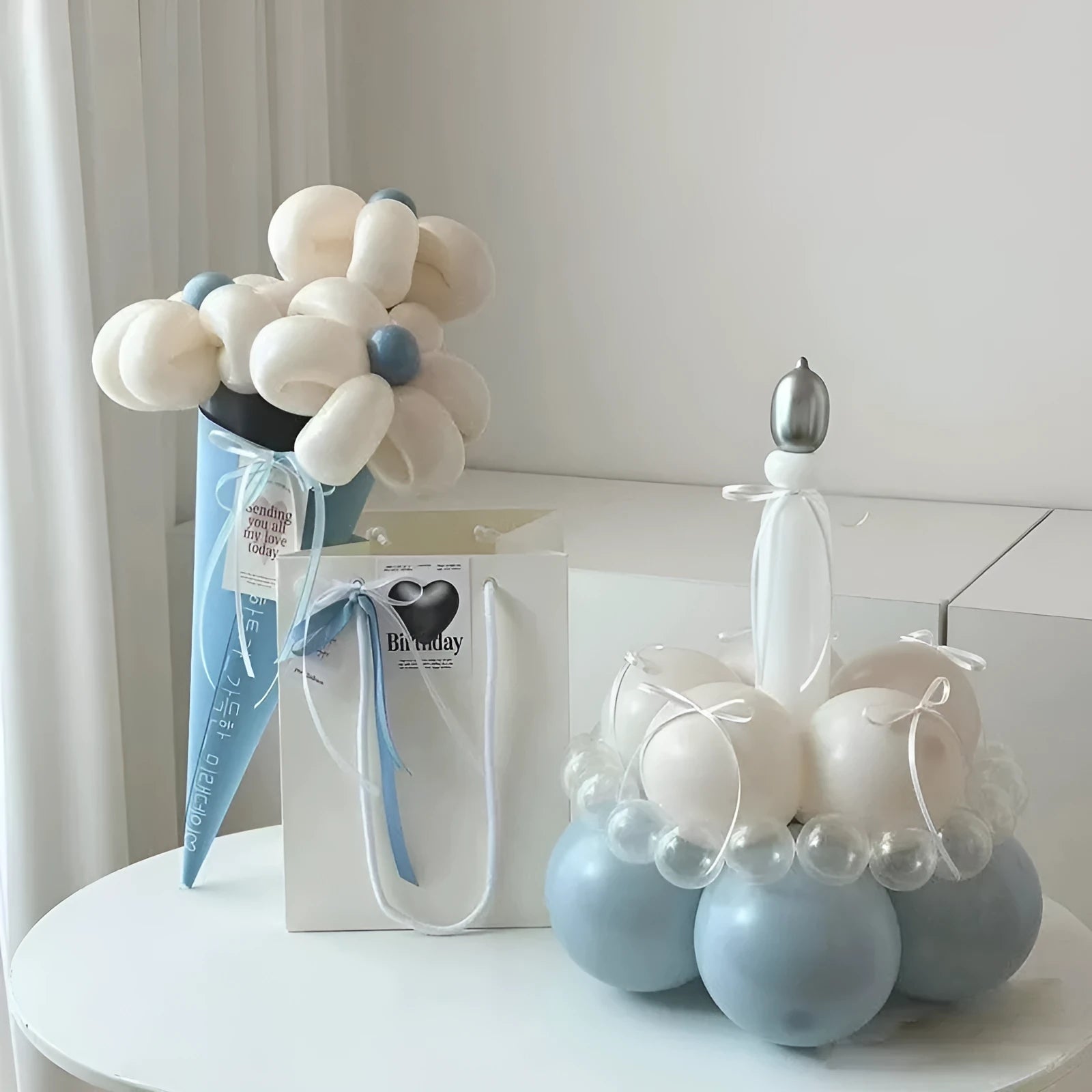 DIY balloon bouquet decoration kit with round balloons for cake toppers, showing one complete set.