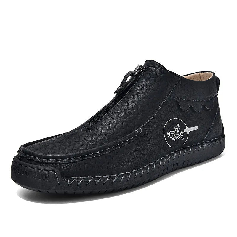 Men's black slip-on casual loafers with a round toe and rubber sole, shown from the side.