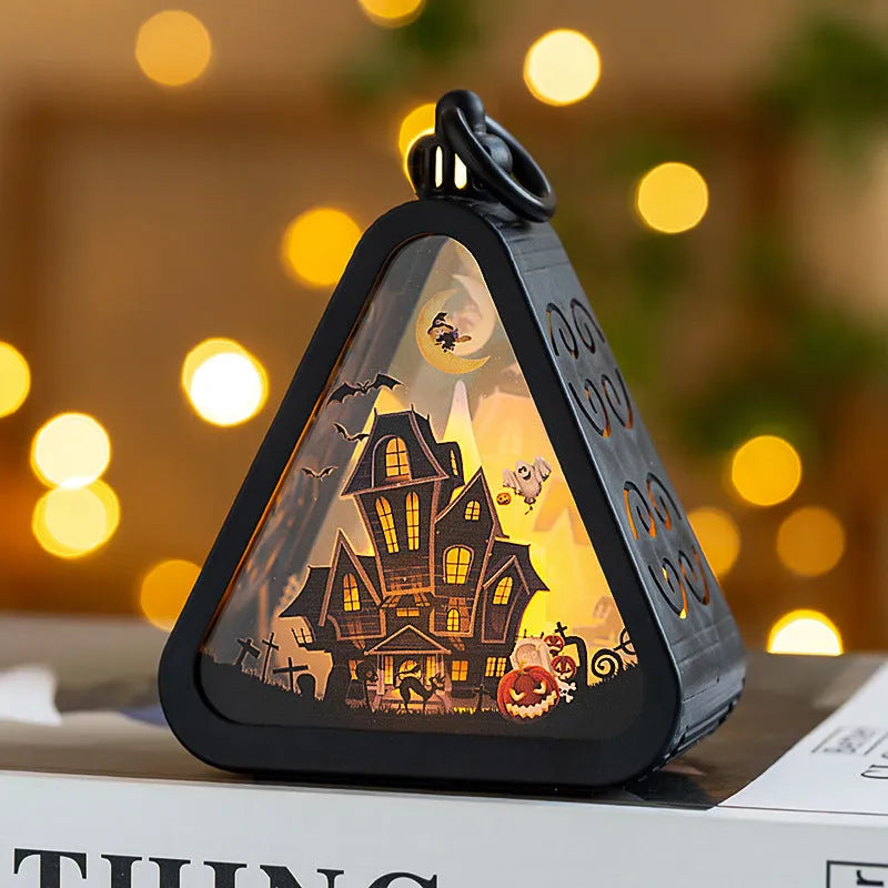 Halloween pumpkin lamp decoration in one of four designs: pumpkin, witch, castle or ghost hand