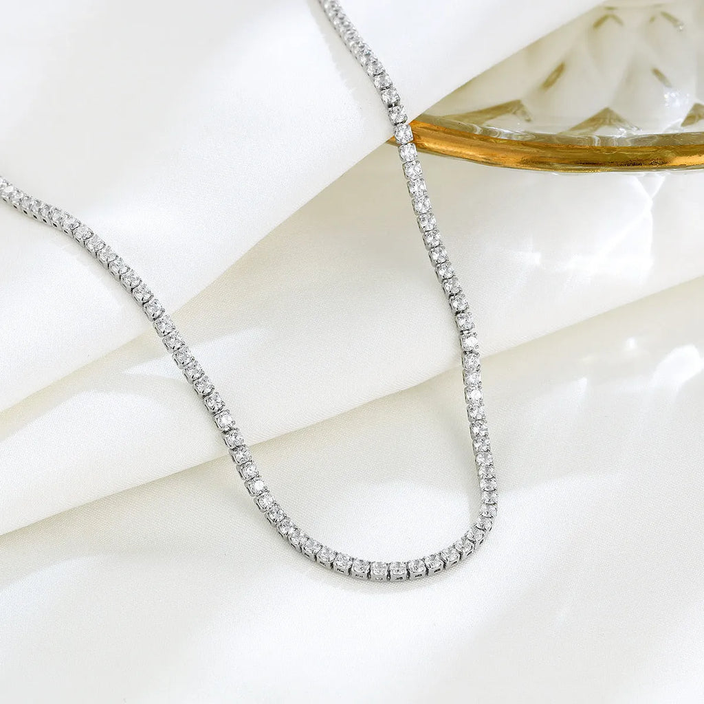 Women's sterling silver necklace with round charm, 925 silver construction with diamond treatment