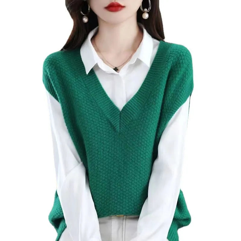 Sleeveless V-neck pullover vest with a textured 3D knit pattern in acrylic fabric, shown in multiple colours.
