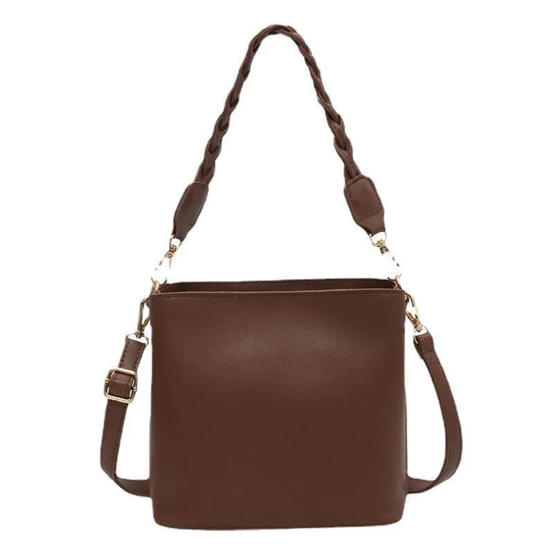 Retro khaki woven PU leather one-shoulder crossbody underarm bucket bag.