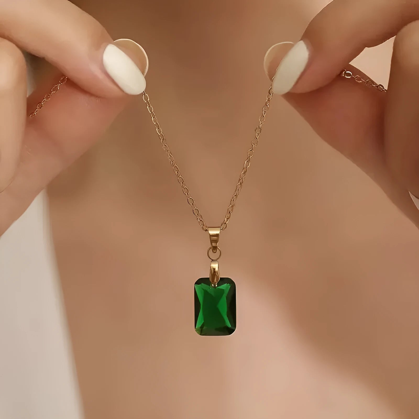 Rectangular green copper geometric pendant necklace on an O-ring chain.