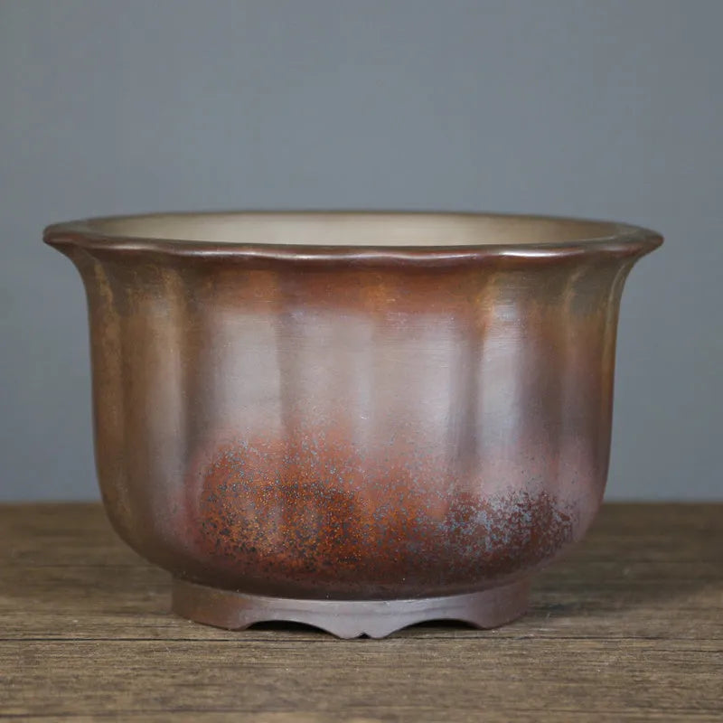 Purple sand ceramic flower pot with antique carved detailing and wood burning finish