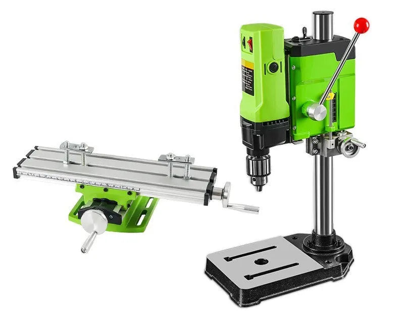 Mini bench drill milling machine with AC power supply and included bench pliers on workbench
