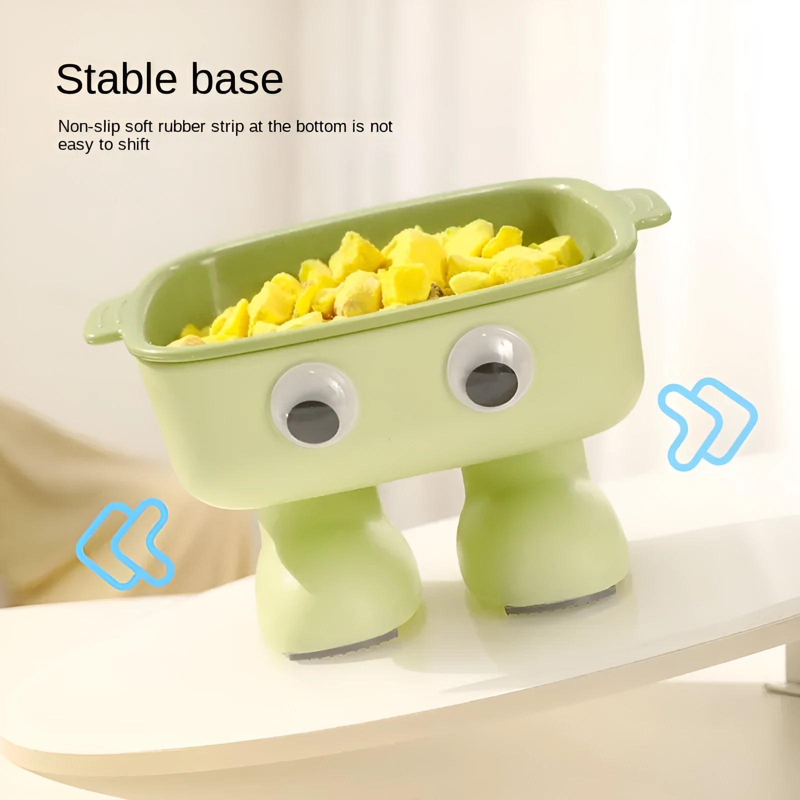 Green robot design elevated pet bowl with tilted feeding surface and detachable inner bowl