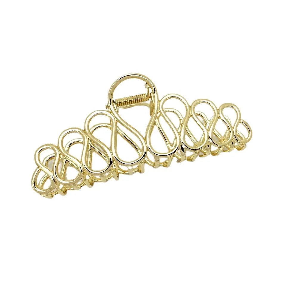 Large minimalist hair clip with tassel detail in gold or silver electroplated alloy
