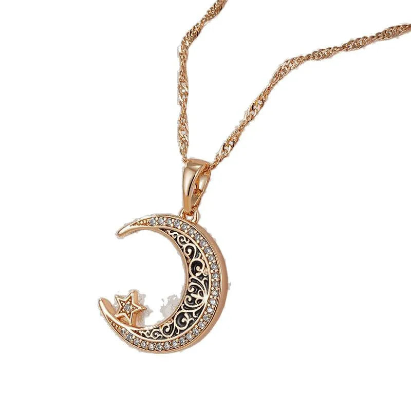 Rose gold star and moon necklace with zircon pendant on a water wave chain.