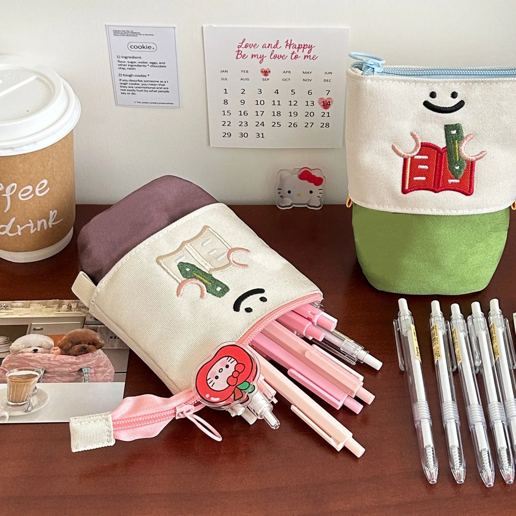 Brown collapsible Korean style pencil case made from Oxford fabric, shown open and closed