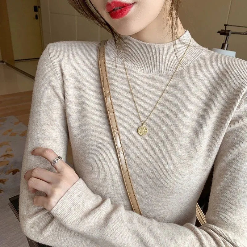 Slim fit long sleeve viscose bottoming shirt in apricot colour on a hanger