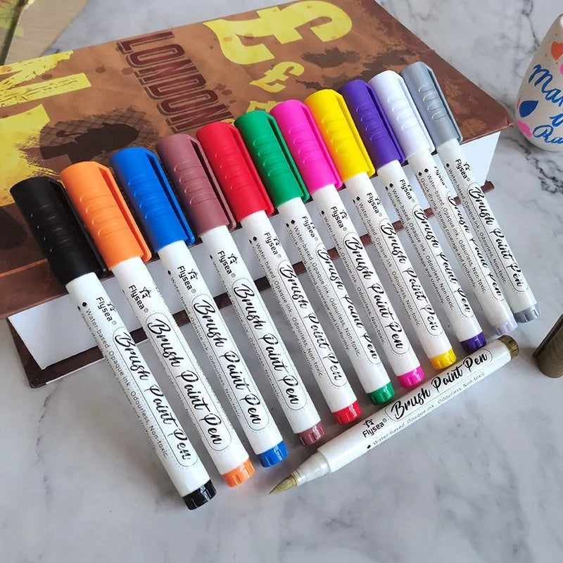 Set of soft-head gouache marker pens in various colours for hand painting and card making.