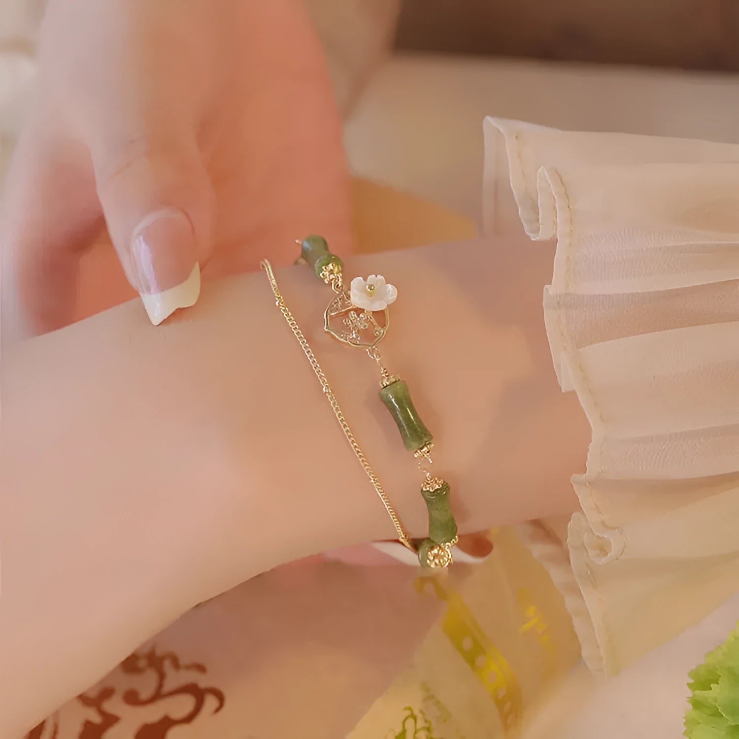 Natural olivine stone bracelet with Chinese double layer design and Bells of Ireland charms