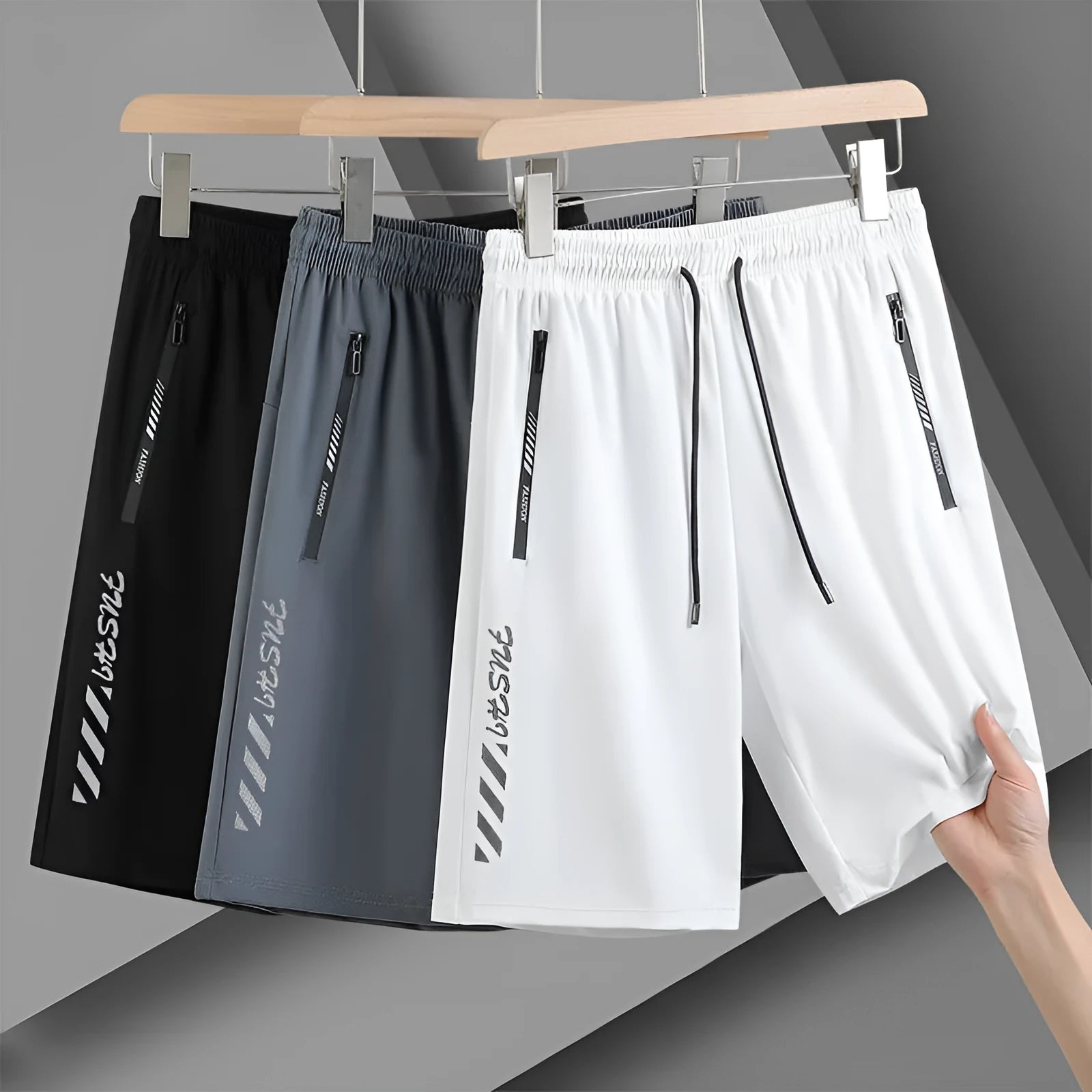 Men's quick-drying nylon sports shorts in black, loose fit with elastic waistband