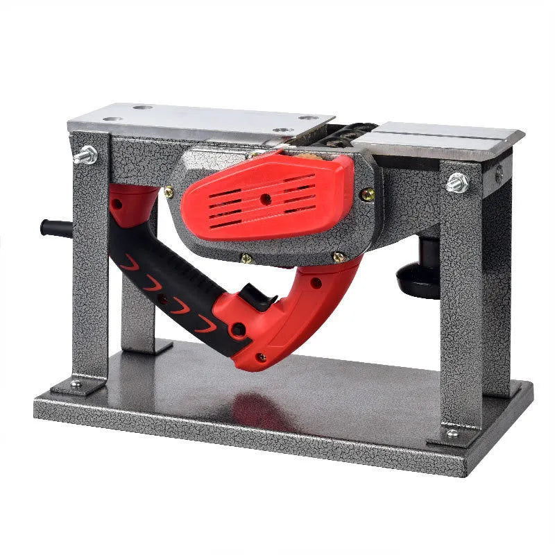 Red desktop electric wood planer with aluminium body showing 82mm cutting width