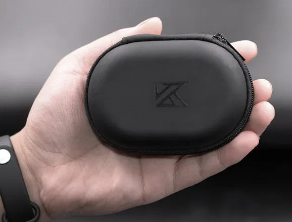 Black oval leather earphone storage bag for portable audio device protection