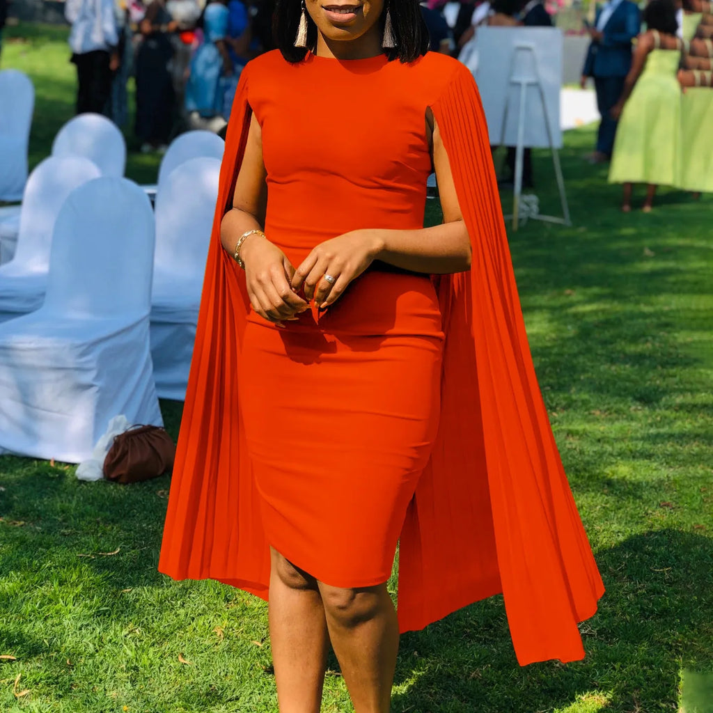 Round neck high waist evening gown with long sleeves and a pleated shawl in yellow, orange, red, or green.