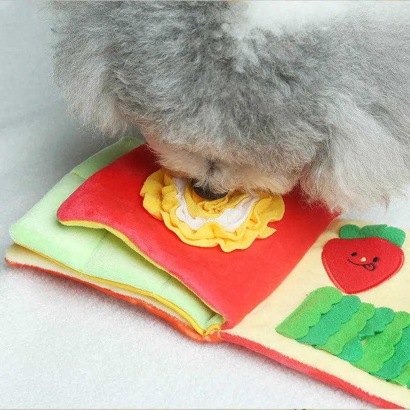 Red book shaped plush pet toy with hidden food compartment and squeaky sound for dogs and cats