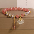 Adjustable strawberry quartz and white agate crystal bracelet with auspicious cloud charms