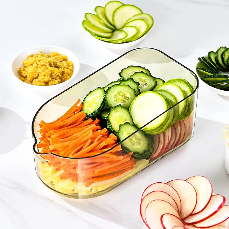 Transparent green vegetable cutter with stainless steel blades and optional drain basket