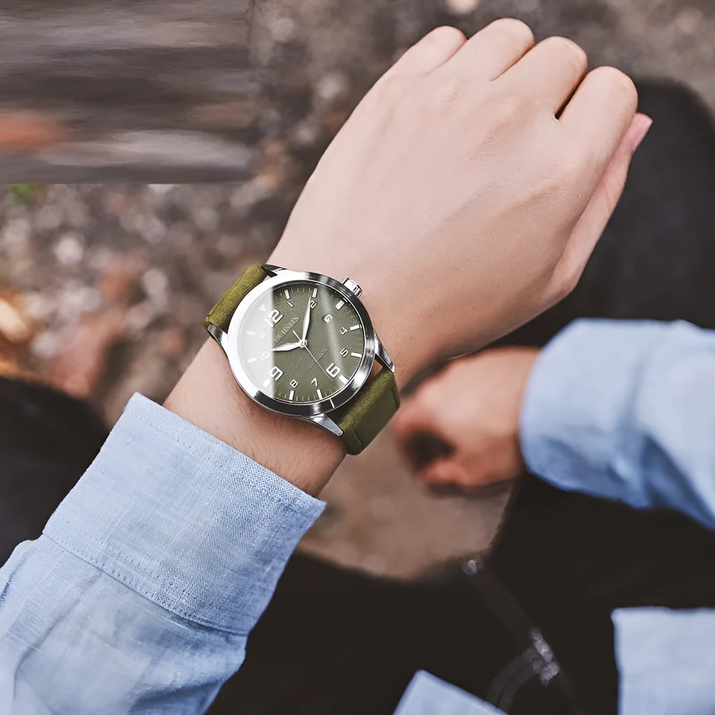 Men's black and silver automatic mechanical watch with leather strap showing 12mm thickness