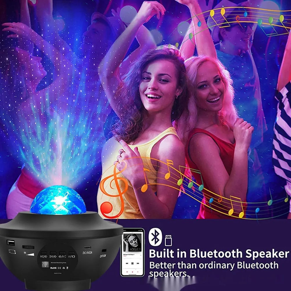 Black starry sky projection lamp with rotating water ripple laser effects on desktop