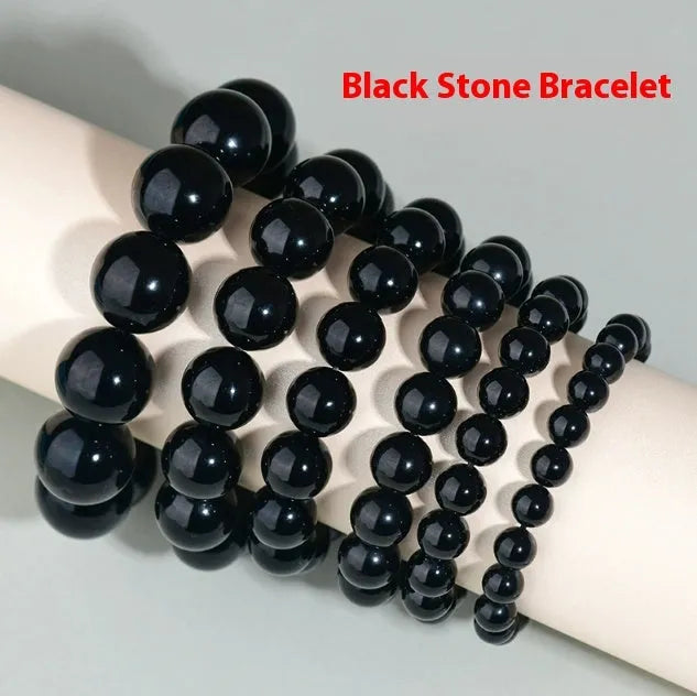 Hand-woven ethnic style unisex obsidian bracelet with round crystal beads.