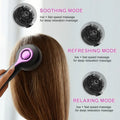 Black USB-powered head massager with a comb head and mechanical speed control switch