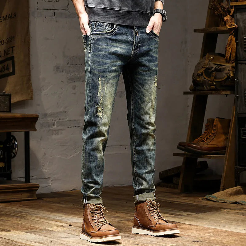 Men's skinny fit retro colour jeans with a zip fly, laid flat.