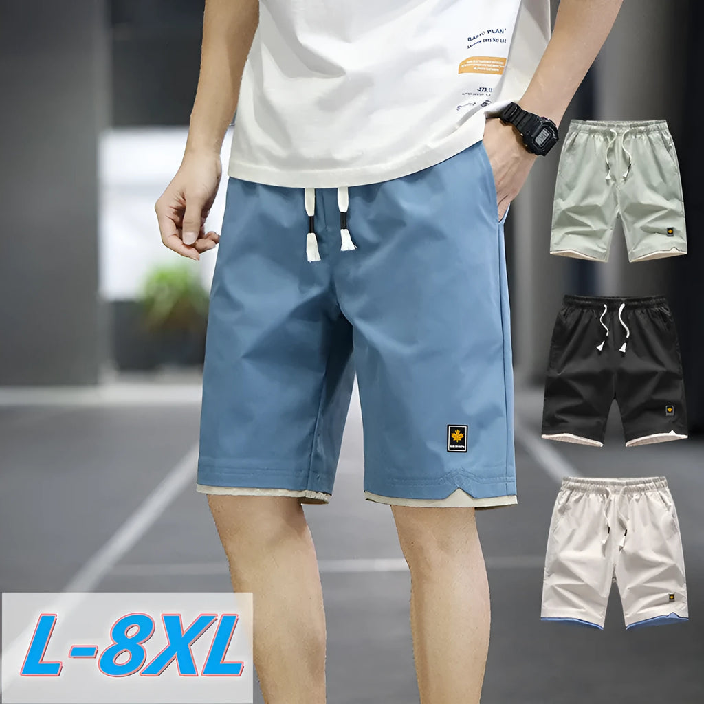 Men's loose-fit straight-leg casual beach shorts in polyester, shown in green.