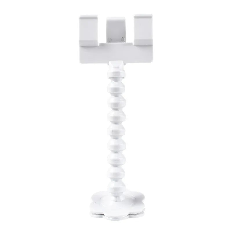 Black pet photography tool holding a mobile phone and a dog treat, on a white background.